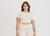 T-shirt maintien léger en ecovero | rose "luxe touch crop tee apricot" - Organic Basics